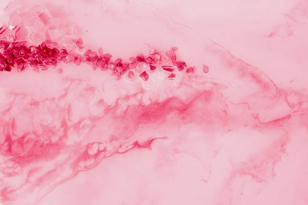 Abstract background, made in the technique of fluid art. the colors of 2023 - Viva Magenta